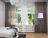 Måttsydd gardin i hemmiljö